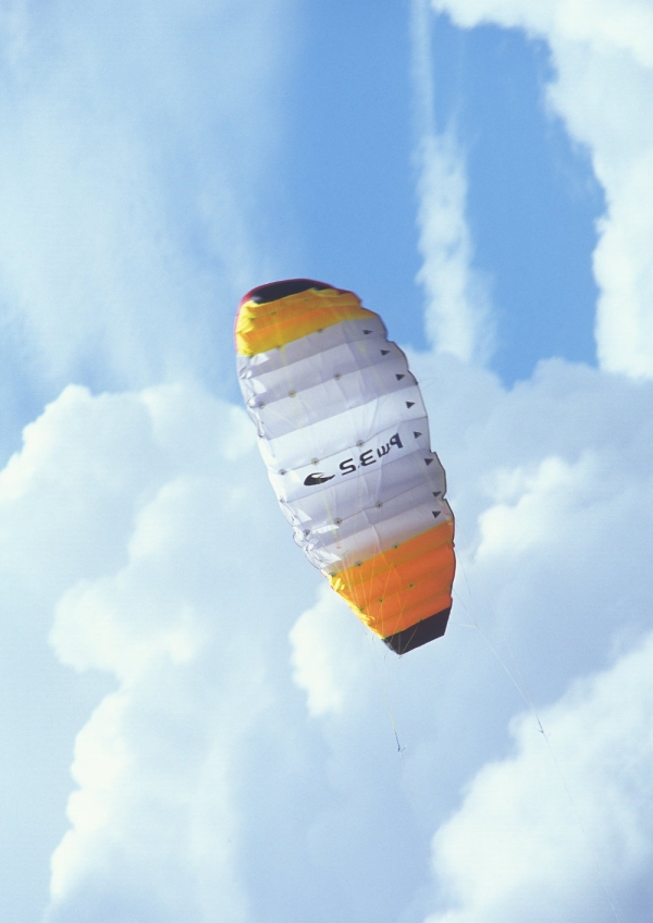 A parachute against a perfect summer sky