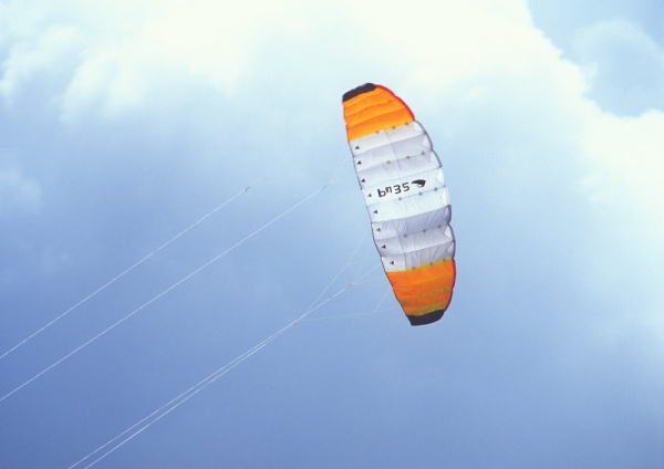 A parachute against a perfect summer sky