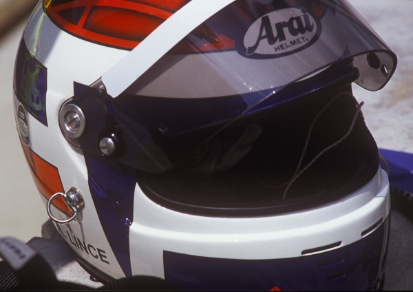 A crash helmet on the roof of a racing car at Rockingham raceway