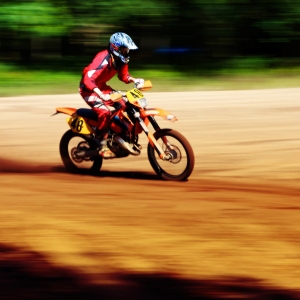 A motocross biker at full speed