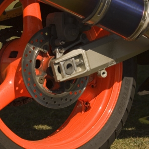 The rear wheel of a racing motorcycle close up