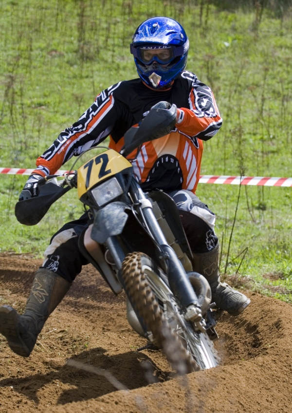 A motocross rider in a cross country endurance race