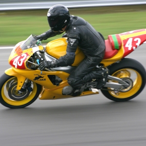 A motorcycle racer at an event at snetterton race track