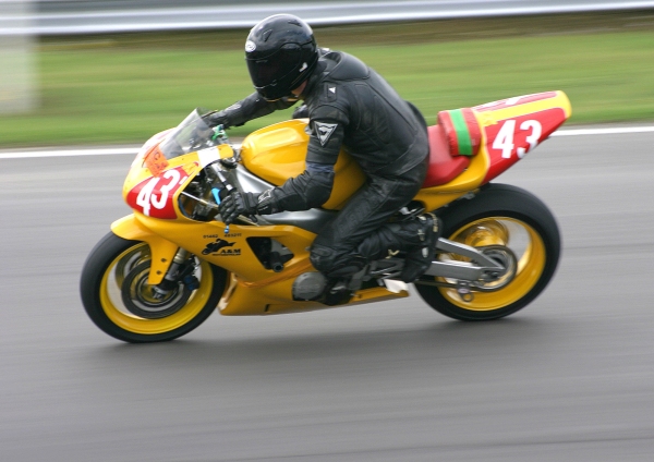 A motorcycle racer at an event at snetterton race track