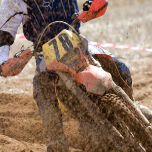 A close up view of a motocross rider in a race