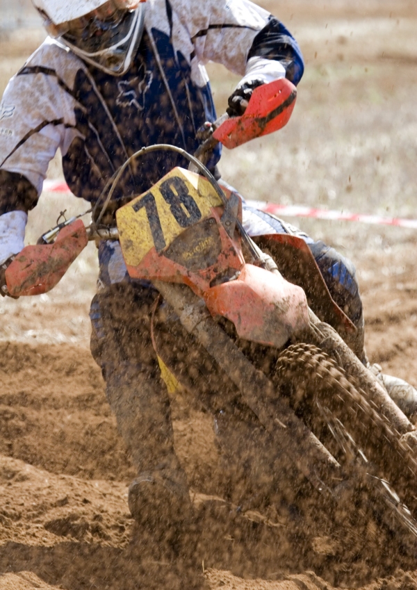 A close up view of a motocross rider in a race