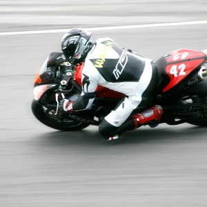 A cornering racing motorcycle