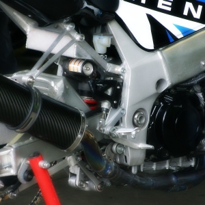 A close up image of the engine of a racing motorbike