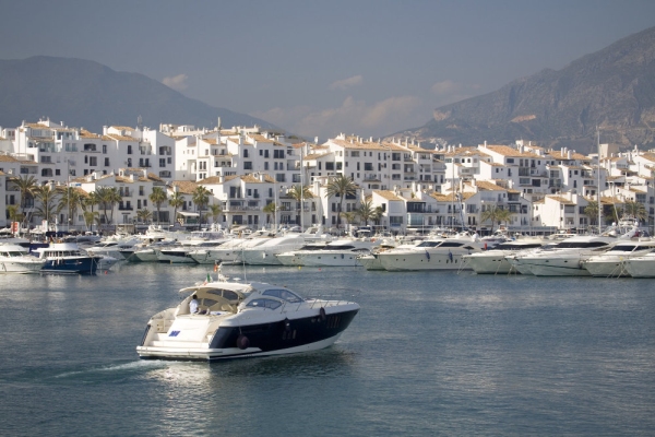 A luxury yacht entering the harbour at Puerto Banus