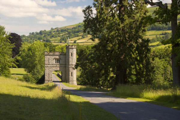 A stone tower above the River Usk in the South Wales countryside