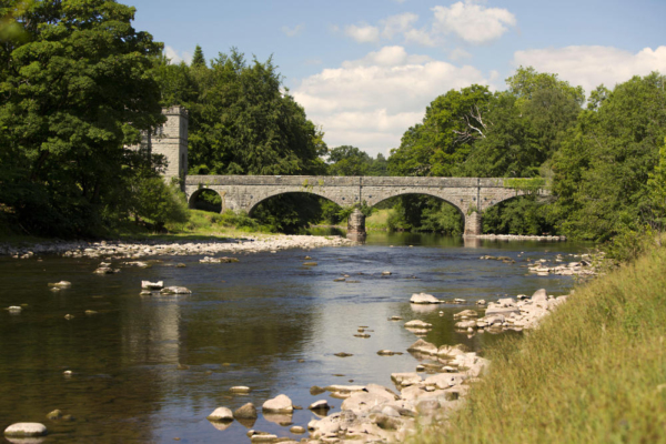 A traditional stone bridge over the River Usk in South Wales