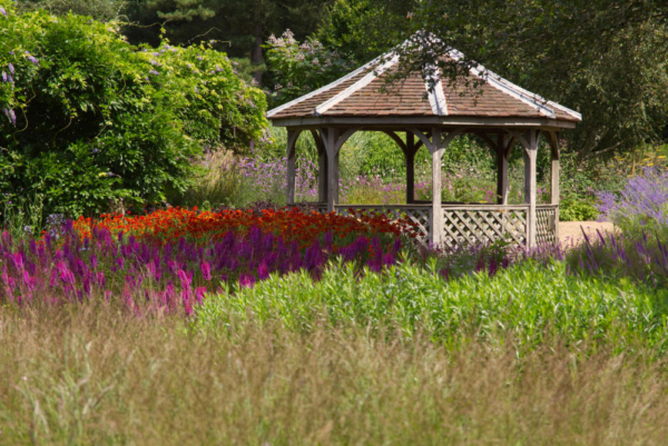 A garden pavilion in a beautiful English summer garden