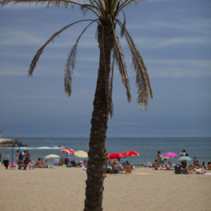 Summer holidays on the beach at Portofino near Marbella in Southern Spain on the Costa del Sol